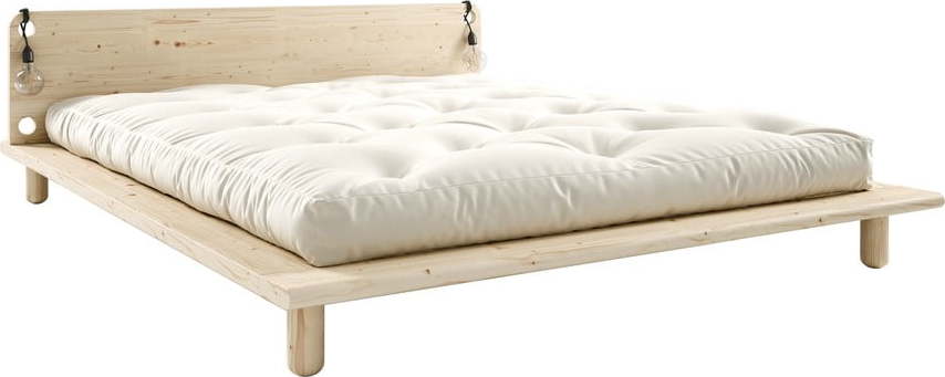 Dvoulůžková postel z masivního dřeva s čelem