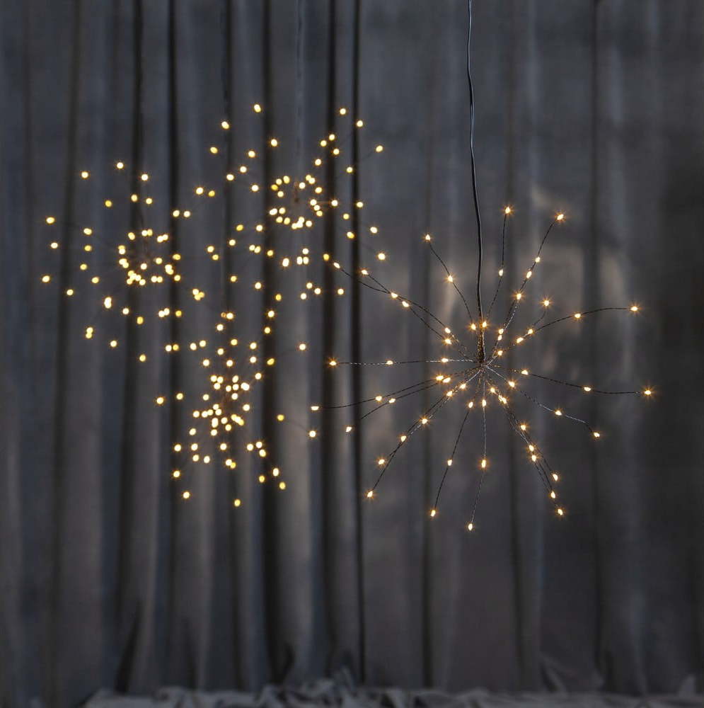 Závěsná svítící LED dekorace Star Trading Hanging Firework Dark Warm