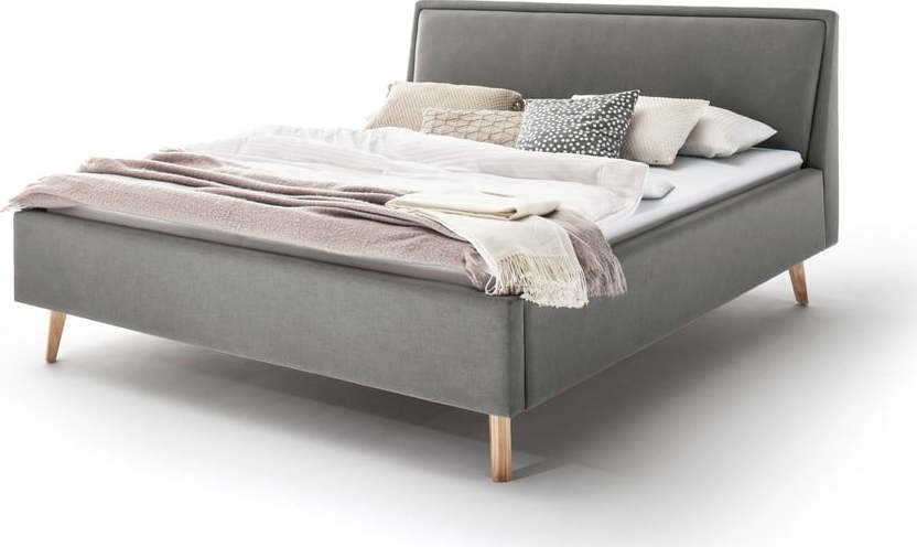 Světle šedá čalouněná dvoulůžková postel s úložným prostorem s roštem 180x200 cm Frieda – Meise Möbel Meise Möbel